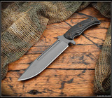 RMJ Tactical Combat Africa fixed blade knife - shown out of sheath.  Tungsten Cerakote 80CrV2 steel plain edge blade.  Black G-10 handle scales.  Model K-CA-TU-BK.