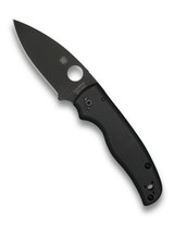 Spyderco Shaman folding knife with thumb hole - shown open presentation side.  Black S30V stainless steel plain edge blade.  Black G-10 handle.  Model C229GPBK.