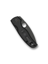 Spyderco Shaman folding knife with thumb hole - shown closed pocket clip side.  Black S30V stainless steel plain edge blade.  Black G-10 handle.  Model C229GPBK.