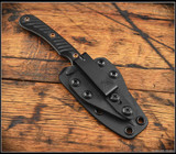 RMJ Tactical Sparrow fixed blade knife - shown in sheath reverse.  Tungsten Cerakote Nitro-V stainless steel plain edge blade.  Black G-10 handle.  Model K-SP-TU-BL