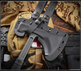 RMJ Tactical Loggerhead tomahawk - shown close up of head in sheath obverse.  Tungsten Cerakote 80CRV2 plain edge head.  Black rubber handle.  Model T-L15-TU-BL.