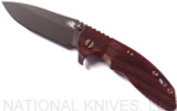 Rick Hinderer Knives Vintage Series XM-18 3.5" Spear Point folding knife with thumb stud and flipper tab - shown open presentation side.  Black O-1 steel plain edge blade.  Smooth Walnut handle with Battle Green lock side.  Model K2082SWPK.
For reference only.