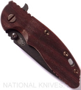Rick Hinderer Knives Vintage Series XM-18 3.5" Spear Point folding knife with thumb stud and flipper tab - shown closed presentation side.  Black O-1 steel plain edge blade.  Smooth Walnut handle with Battle Green lock side.  Model K2082SWPK.
For reference only.