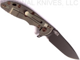 Rick Hinderer Knives Vintage Series XM-18 3.5" Spear Point folding knife with thumb stud and flipper tab - shown open lock side.  Black O-1 steel plain edge blade.  Textured Walnut handle with Battle Green lock side.  Model K2082SWPK.
For reference only.