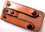 RMJ Tactical Custom Valhalla Kestrel Tomahawk with Triskelle pattern - reverse belt ring shown.  80CRV2 steel plain edge head.  Brown Micarta handle scales.  
For reference only.