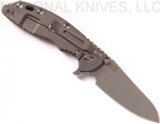 Rick Hinderer Knives XM-18 3.5" Sheepsfoot folding knife with thumb stud and flipper tab - shown open lock side.  Working Finish 20CV stainless steel plain edge blade.  Black G-10 handle with Working Finish lock side.  Model K2522SGW00.
