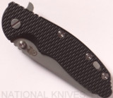 Rick Hinderer Knives XM-18 3.5" Sheepsfoot folding knife with thumb stud and flipper tab - shown closed presentation side.  Working Finish 20CV stainless steel plain edge blade.  Black G-10 handle with Working Finish lock side.  Model K2522SGW00.
