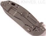 Rick Hinderer Knives XM-18 3.5" Sheepsfoot folding knife with thumb stud and flipper tab - shown closed lock side.  Working Finish 20CV stainless steel plain edge blade.  Black G-10 handle with Working Finish lock side.  Model K2522SGW00.
