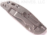 Rick Hinderer Knives Non Flipper XM-18 3.5" Spear Point folding knife with thumb stud - shown closed lock side.  Stonewash 20CV stainless steel plain edge blade.  OD green G-10 handle with stonewash lock side.  Model K20821SGS00.