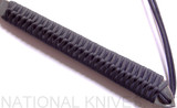 RMJ Tactical Custom Raven tomahawk - close up of handle.  80CRV2 steel plain edge head.  Black cord-wrapped handle.
For reference only.