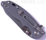 Rick Hinderer Knives Skinny XM-18 3.0" Sheepsfoot folding knife with thumb stud and flipper tab - shown closed pocket clip side.  Stonewash 20CV stainless steel plain edge blade.  Grey G-10 handle with stonewash lock.  Model K1101SSGS00.