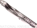 Rick Hinderer Knives Skinny XM-18 3.0" Sheepsfoot folding knife with thumb stud and flipper tab - shown open close up of lock.  Stonewash 20CV stainless steel plain edge blade.  Grey G-10 handle with stonewash lock.  Model K1101SSGS00.