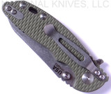 Rick Hinderer Knives Skinny XM-18 3.0" Sheepsfoot folding knife with thumb stud and flipper tab - shown closed pocket clip side.  Stonewash 20CV stainless steel plain edge blade.  OD green G-10 handle with stonewash lock.  Model K1101SSGS00.