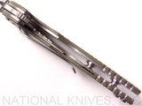 Rick Hinderer Knives Skinny XM-18 3.0" Sheepsfoot folding knife with thumb stud and flipper tab - shown open close up of lock.  Stonewash 20CV stainless steel plain edge blade.  OD green G-10 handle with stonewash lock.  Model K1101SSGS00.