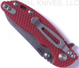 Rick Hinderer Knives Skinny XM-18 3.0" Sheepsfoot folding knife with thumb stud and flipper tab - shown closed pocket clip side.  Stonewash 20CV stainless steel plain edge blade.  Red G-10 handle with stonewash lock.  Model K1101SSGS00.