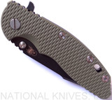 Rick Hinderer Knives XM-18 3.5" Harpoon Spanto folding knife with thumb stud and flipper tab - shown closed presentation side.  Black stonewash S35VN stainless steel plain edge blade.  OD green G-10 handle with stonewash black lock side.  Model K2552SGD00.