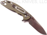 Rick Hinderer Knives Skinny XM-18 Slicer folding knife with thumb studs and flipper tab - shown open pocket clip side.  Stonewash 20CV stainless steel plain edge blade.  OD green G-10 handle with stonewash lock.  Model K1011SSGS00.