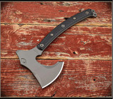 RMJ Tactical Berserker Axe - shown out of sheath reverse. Tungsten Cerakote 80CrV2 steel blade. Black G-10 handle scales. RMJ Tactical Berserker Axe - shown out of sheath reverse. Tungsten Cerakote 80CrV2 steel blade. Black G-10 handle scales.