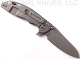 Rick Hinderer Knives Skinny XM-18 3.5" Sheepsfoot folding knife with thumb stud and flipper tab - shown open lock side.  Working Finish 20CV stainless steel plain edge blade.  FDE G-10 handle with Working Finish lock side.  Model K2525SGS00.