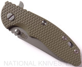 Rick Hinderer Knives Skinny XM-18 3.5" Sheepsfoot folding knife with thumb stud and flipper tab - shown closed presentation side.  Working Finish 20CV stainless steel plain edge blade.  OD green G-10 handle with Working Finish lock side.  Model K2525SGS00.