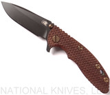 Rick Hinderer Knives Vintage Series XM-18 3.0" Spear Point folding knife with thumb studs and flipper tab - shown open presentation side.  Black O-1 steel plain edge blade.  Textured Walnut handle with Battle Green lock side.  Model K1081S0VT-TX.
For reference only.