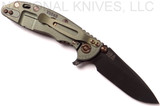 Rick Hinderer Knives Vintage Series XM-18 3.0" Spear Point folding knife with thumb studs and flipper tab - shown open lock side.  Black O-1 steel plain edge blade.  Textured Walnut handle with Battle Green lock side.  Model K1081S0VT-TX.
For reference only.