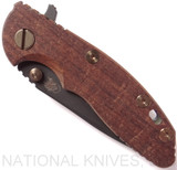 Rick Hinderer Knives Vintage Series XM-18 3.0" Spear Point folding knife with thumb studs and flipper tab - shown closed presentation side.  Black O-1 steel plain edge blade.  Smooth Walnut handle with Battle Green lock side.  Model K1081S0VT-SM.
For reference only.