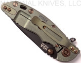 Rick Hinderer Knives Vintage Series XM-18 3.0" Spear Point folding knife with thumb studs and flipper tab - shown closed lock side.  Black O-1 steel plain edge blade.  Smooth Walnut handle with Battle Green lock side.  Model K1081S0VT-SM.
For reference only.