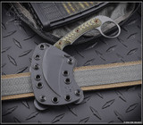 RMJ Tactical Korbin Karambit fixed blade knife - shown in sheath obverse.  Tungsten Cerakote Nitro-V stainless steel plain edge blade.  Dirty Olive G-10 handle.  Model K-KO-TU-DO.