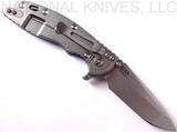 Rick Hinderer Knives XM-18 3.5" Spanto folding knife with thumb stud and flipper tab - shown open lock side.  Stonewash 20CV stainless steel plain edge blade.  Blue G-10 handle with stonewash lock side.  Model K2002SGS00.