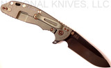 Rick Hinderer Knives Vintage Series XM-24 Spear Point folding knife with thumb stud and flipper tab - shown open lock side.  Black O-1 steel plain edge blade.  Smooth Walnut handle with Battle Green lock side.  Model K3083S0VT00.
For reference only.