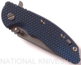 Rick Hinderer Knives XM-18 3.5" Spear Point folding knife with thumb stud and flipper tab - shown closed presentation side.  Working Finish 20CV stainless steel plain edge blade.  Blue - black G-10 handle with Battle Blue lock side.  Model K2082SGW00.