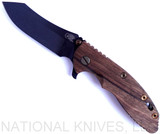 Rick Hinderer Knives Vintage Series XM-18 3.5" Skinner folding knife with thumb stud and flipper tab - shown open presentation side.  Black O-1 steel plain edge blade.  Smooth Walnut handle with Battle Green titanium lock side.  Model K2042S0VT00.
For reference only.