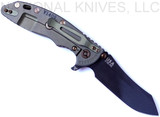 Rick Hinderer Knives Vintage Series XM-18 3.5" Skinner folding knife with thumb stud and flipper tab - shown open lock side.  Black O-1 steel plain edge blade.  Smooth Walnut handle with Battle Green titanium lock side.  Model K2042S0VT00.
For reference only.
