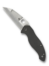 Spyderco Canis folding knife with thumb hole - shown open presentation side.  Satin S30V stainless steel plain edge blade.  Black carbon fiber and G-10 laminate handle.  Model C248CFP.