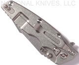 Rick Hinderer Knives Eklipse Harpoon Tanto folding knife with thumb stud and flipper tab - shown closed lock side.  Stonewash 20CV stainless steel plain edge blade.  Black G-10 handle with stonewash lock side.  Model K4054SGS00.