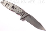 Rick Hinderer Knives Eklipse Harpoon Tanto folding knife with thumb stud and flipper tab - shown open lock side.  Stonewash 20CV stainless steel plain edge blade.  Orange G-10 handle with stonewash lock side.  Model K4054SGS00.