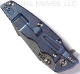 Rick Hinderer Knives Eklipse Harpoon Tanto folding knife with thumb stud and flipper tab - shown closed lock side.  Stonewash 20CV stainless steel plain edge blade.  Black G-10 handle with stonewash blue lock side.  Model K4054SGS00.