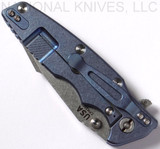 Rick Hinderer Knives Eklipse Harpoon Tanto folding knife with thumb stud and flipper tab - shown closed lock side.  Stonewash 20CV stainless steel plain edge blade.  Blue - black G-10 handle with stonewash blue lock side.  Model K4054SGS00.