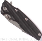 Rick Hinderer Knives Eklipse Harpoon Tanto folding knife with thumb stud and flipper tab - shown closed presentation side.  Working Finish 20CV stainless steel plain edge blade.  Black G-10 handle with Working Finish lock side.  Model K4054SGW00.