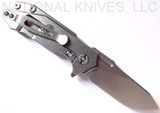 Rick Hinderer Knives Half Track Slicer folding knife with flipper tab - shown open lock side.  Stonewash 20CV stainless steel plain edge blade.  Black G-10 handle with stonewash titanium lock side.  Model K2009SGS00.