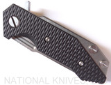 Rick Hinderer Knives Half Track Slicer folding knife with flipper tab - shown closed presentation side.  Stonewash 20CV stainless steel plain edge blade.  Black G-10 handle with stonewash titanium lock side.  Model K2009SGS00.