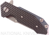 Rick Hinderer Knives Half Track Slicer folding knife with flipper tab - shown closed presentation side.  Stonewash 20CV stainless steel plain edge blade.  Black G-10 handle with Battle Blue titanium lock side.  Model K2009SGS00.