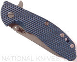 Rick Hinderer Knives XM-24 Sheepsfoot folding knife with thumb stud and flipper tab - shown closed presentation side.  Working Finish 20CV stainless steel plain edge blade.  Blue - black G-10 handle with Battle Blue lock side.  Model K3073SGW00.
