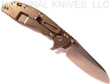 Rick Hinderer Knives XM-24 Sheepsfoot folding knife with thumb stud and flipper tab - shown open lock side.  Stonewash 20CV stainless steel plain edge blade.  OD green G-10 handle with stonewash bronze lock side.  Model K3073SGS00.
