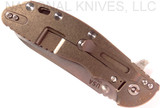 Rick Hinderer Knives XM-24 Sheepsfoot folding knife with thumb stud and flipper tab - shown closed lock side.  Stonewash 20CV stainless steel plain edge blade.  OD green G-10 handle with stonewash bronze lock side.  Model K3073SGS00.
