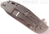 Rick Hinderer Knives XM-24 Sheepsfoot folding knife with thumb stud and flipper tab - shown closed lock side.  Stonewash 20CV stainless steel plain edge blade.  Black G-10 handle with stonewash lock side.  Model K3073SGS00.
