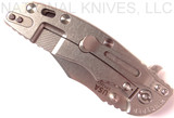 Rick Hinderer Knives XM-18 3.5" Bowie folding knife with thumb stud and flipper tab - shown closed lock side.  Stonewash 20CV stainless steel plain edge blade.  Black G-10 handle with stonewash titanium lock side.  Model K2032SGS00.