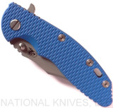 Rick Hinderer Knives XM-18 3.5" Bowie folding knife with thumb stud and flipper tab - shown closed presentation side.  Working Finish 20CV stainless steel plain edge blade.  Blue G-10 handle with Battle Blue titanium lock side.  Model K2032SGW00.