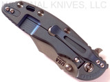 Rick Hinderer Knives XM-18 3.5" Bowie folding knife with thumb stud and flipper tab - shown closed lock side.  Working Finish 20CV stainless steel plain edge blade.  Blue G-10 handle with Battle Blue titanium lock side.  Model K2032SGW00.